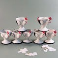 Load image into Gallery viewer, Circa 1950-60's Holt Howard Cog Rouge Egg Cups - Made in Japan - Set of 7
