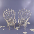 Load and play video in Gallery viewer, Vintage Distressed White Iron Miniature Peacock Chair Plant Stands - Set of 2
