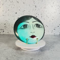 Load and play video in Gallery viewer, Vintage Hand Painted Circular Ceramic Face Sculpture Moon with Open Eyes & Blue Background Signed J Alverez
