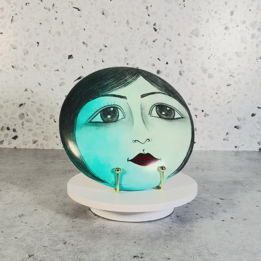 Vintage Hand Painted Circular Ceramic Face Sculpture Moon with Open Eyes & Blue Background Signed J Alverez